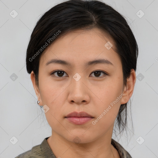 Neutral asian young-adult female with medium  brown hair and brown eyes