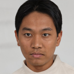 Neutral asian young-adult male with short  black hair and brown eyes