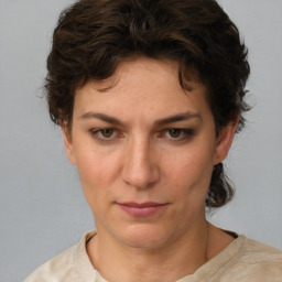 Neutral white young-adult female with short  brown hair and brown eyes