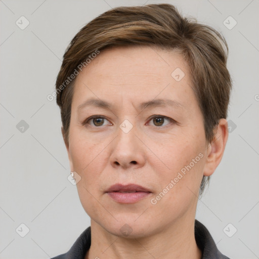 Neutral white adult female with short  brown hair and grey eyes