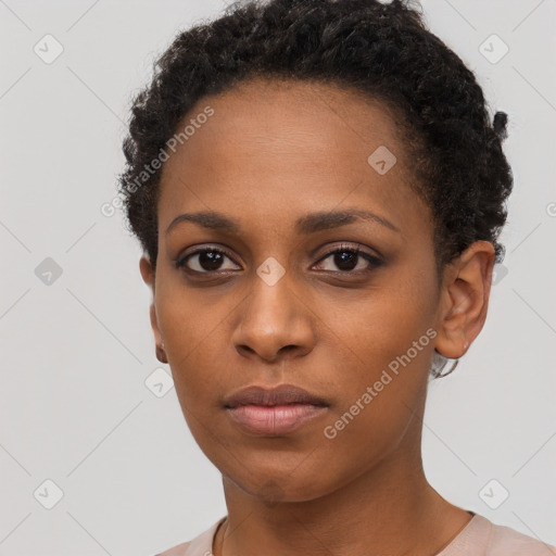 Neutral black young-adult female with short  brown hair and brown eyes