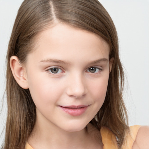 Joyful white child female with long  brown hair and brown eyes