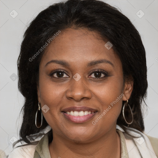 Joyful black young-adult female with medium  brown hair and brown eyes