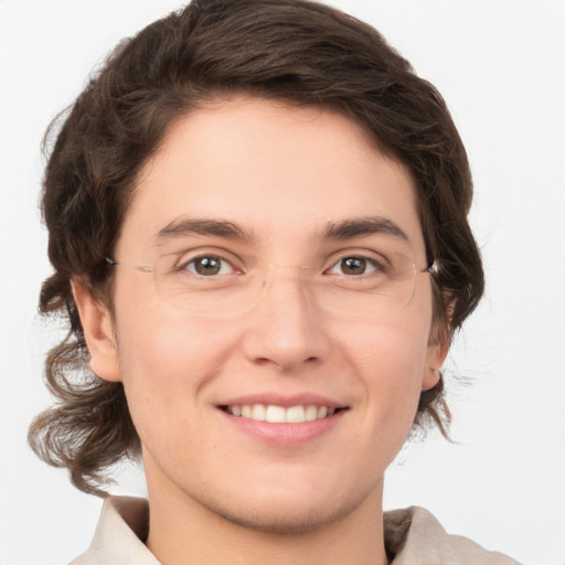 Joyful white young-adult male with medium  brown hair and brown eyes