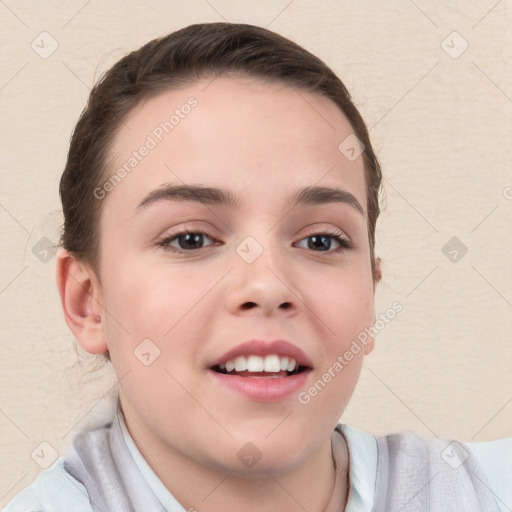 Joyful white child female with short  brown hair and brown eyes