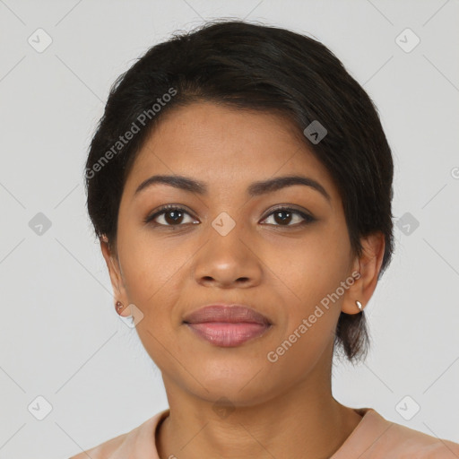 Joyful latino young-adult female with short  brown hair and brown eyes