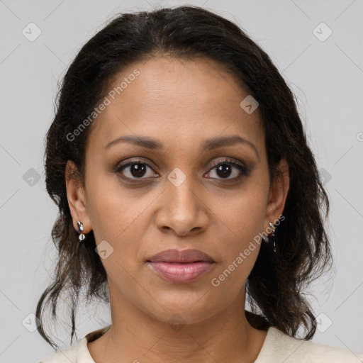 Joyful black young-adult female with medium  brown hair and brown eyes