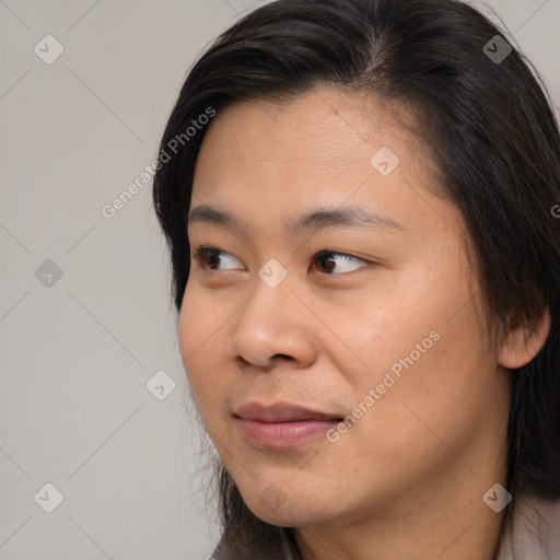 Joyful asian young-adult female with medium  brown hair and brown eyes