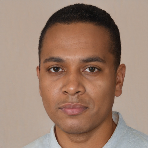 Neutral black young-adult male with short  black hair and brown eyes