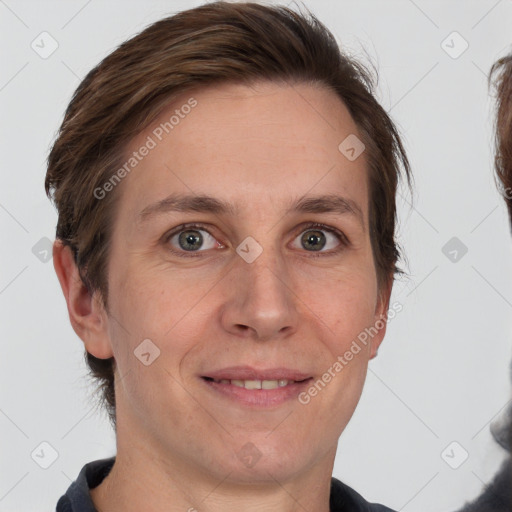 Joyful white adult female with short  brown hair and grey eyes