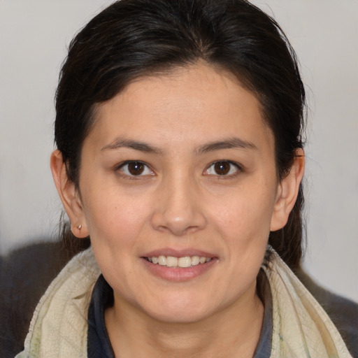 Joyful white young-adult female with medium  brown hair and brown eyes