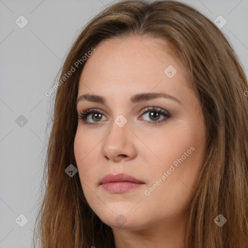 Neutral white young-adult female with long  brown hair and brown eyes