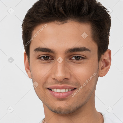 Joyful white young-adult male with short  brown hair and brown eyes