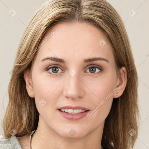 Joyful white young-adult female with medium  brown hair and blue eyes