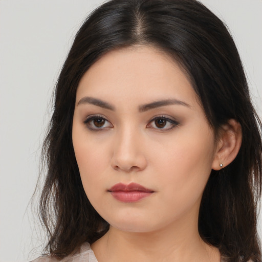 Neutral asian young-adult female with long  brown hair and brown eyes