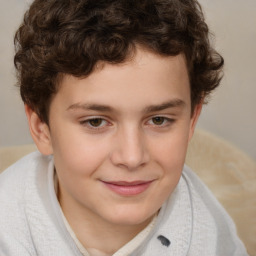 Joyful white child male with short  brown hair and brown eyes