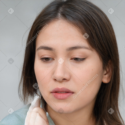 Neutral white young-adult female with long  brown hair and brown eyes