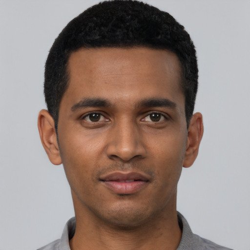 Neutral black young-adult male with short  black hair and brown eyes