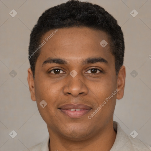 Joyful black young-adult male with short  black hair and brown eyes