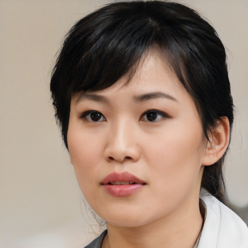 Neutral asian young-adult female with medium  black hair and brown eyes