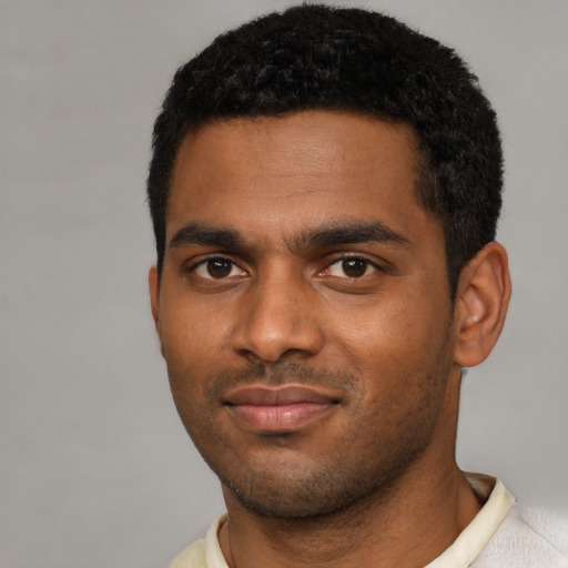 Neutral black young-adult male with short  black hair and brown eyes