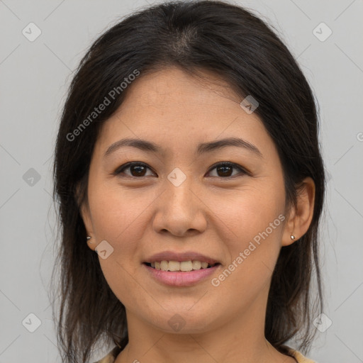 Joyful asian young-adult female with medium  brown hair and brown eyes