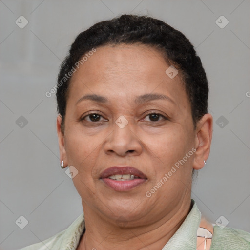 Joyful latino adult female with short  brown hair and brown eyes