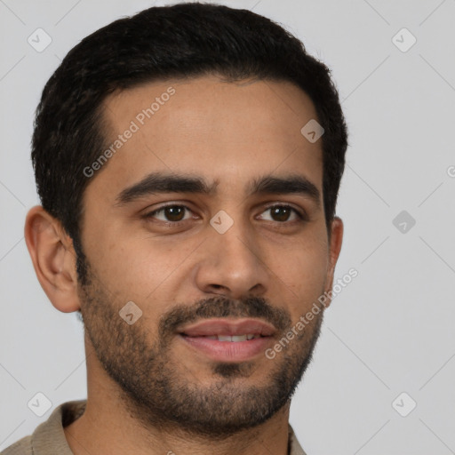 Joyful latino young-adult male with short  brown hair and brown eyes