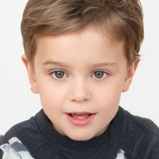 Joyful white child male with short  brown hair and brown eyes