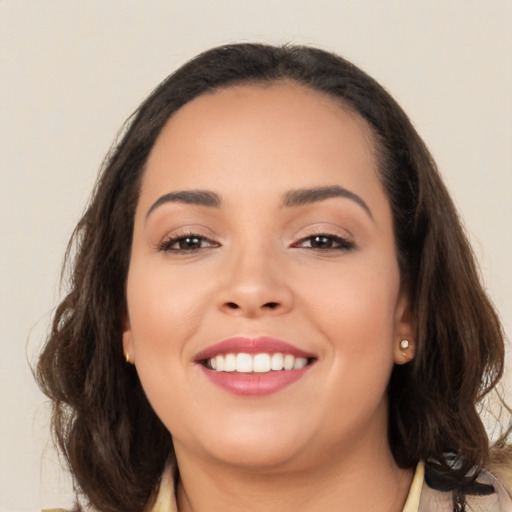 Joyful white young-adult female with medium  brown hair and brown eyes