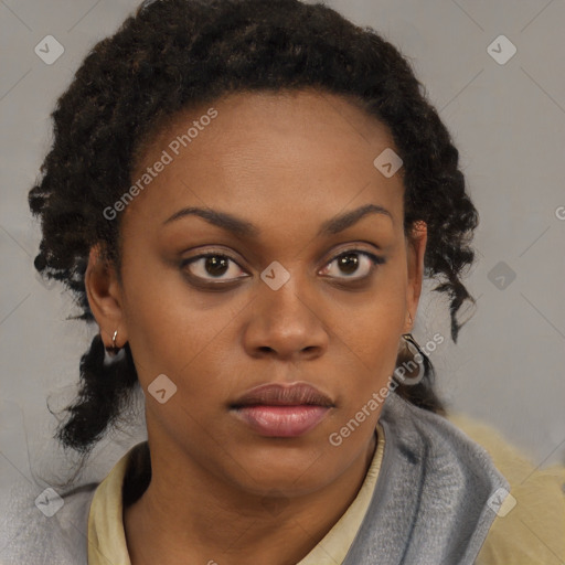 Neutral black young-adult female with medium  brown hair and brown eyes