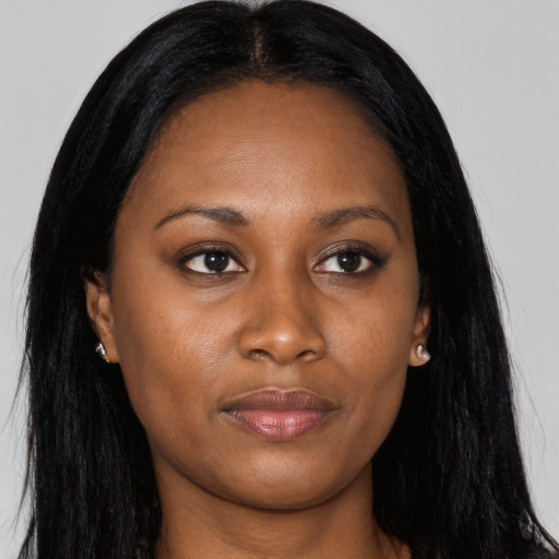 Joyful asian young-adult female with long  black hair and brown eyes