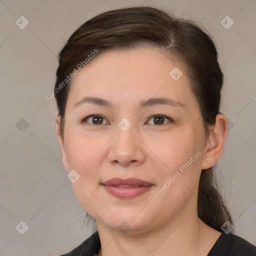 Joyful white young-adult female with medium  brown hair and brown eyes