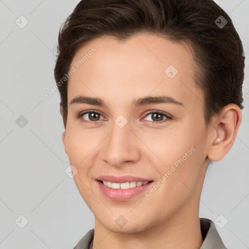 Joyful white young-adult female with short  brown hair and brown eyes