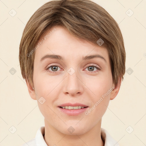 Joyful white young-adult female with short  brown hair and grey eyes