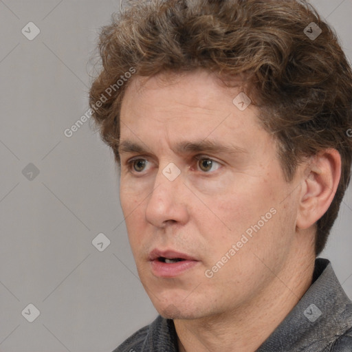 Neutral white adult male with short  brown hair and brown eyes