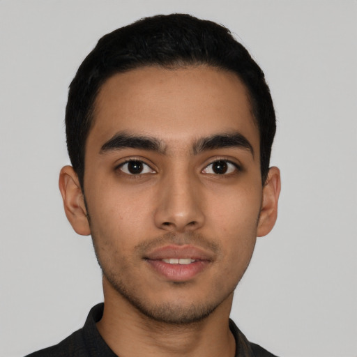 Neutral latino young-adult male with short  black hair and brown eyes
