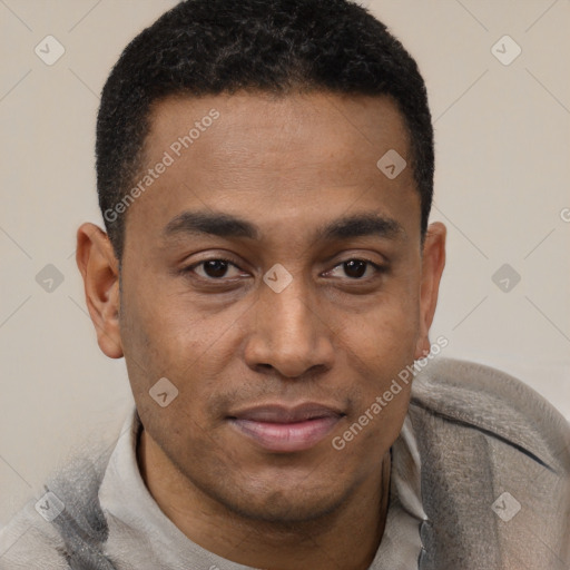 Joyful latino young-adult male with short  black hair and brown eyes