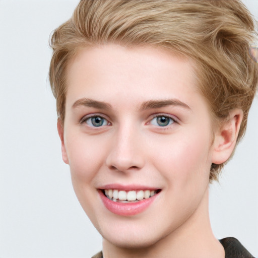 Joyful white young-adult female with short  brown hair and grey eyes