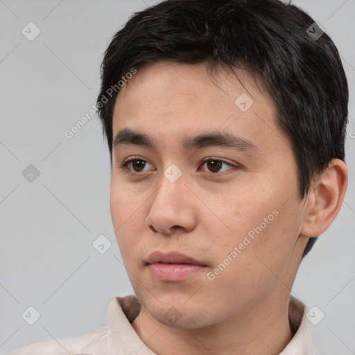 Neutral white young-adult male with short  black hair and brown eyes