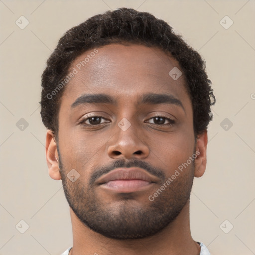 Neutral black young-adult male with short  brown hair and brown eyes