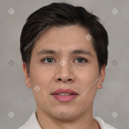 Joyful white young-adult male with short  brown hair and brown eyes