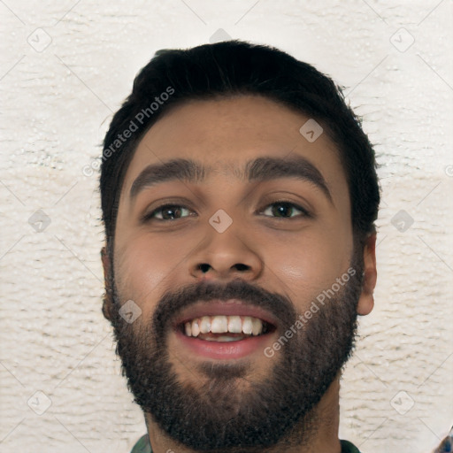 Joyful latino young-adult male with short  black hair and brown eyes