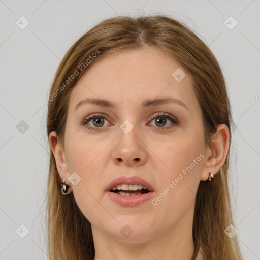 Joyful white young-adult female with long  brown hair and grey eyes