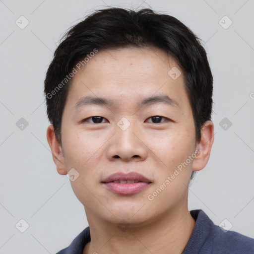 Neutral asian young-adult male with short  brown hair and brown eyes