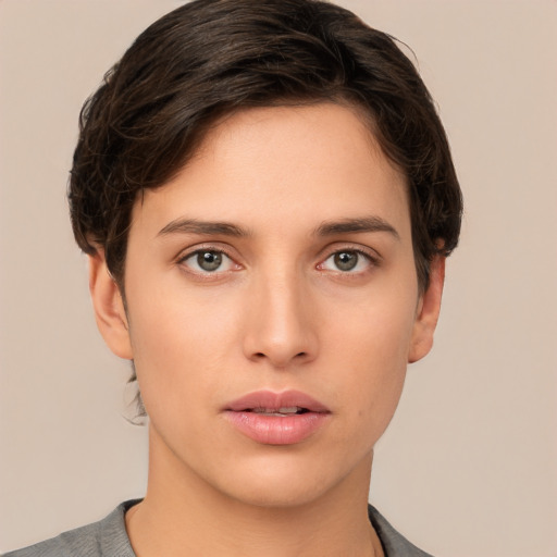 Neutral white young-adult female with short  brown hair and brown eyes