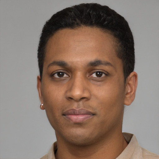 Neutral latino young-adult male with short  black hair and brown eyes