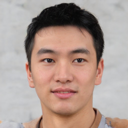 Neutral asian young-adult male with short  brown hair and brown eyes