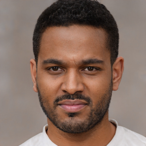 Neutral black young-adult male with short  black hair and brown eyes