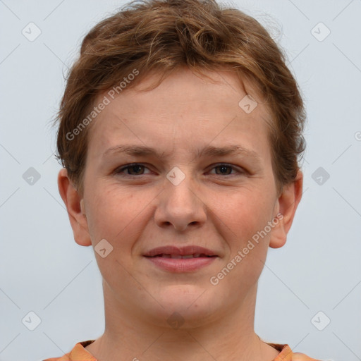 Joyful white young-adult female with short  brown hair and brown eyes